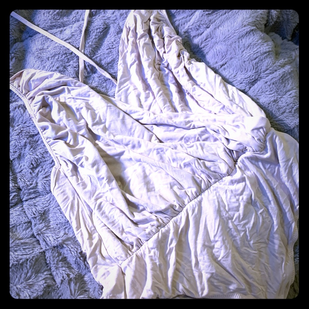 Nude skinny strap bodysuit. Brand new!